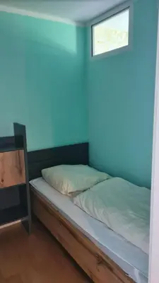 Ein Bett oder Betten in einem Zimmer der Unterkunft Appartement 7 101