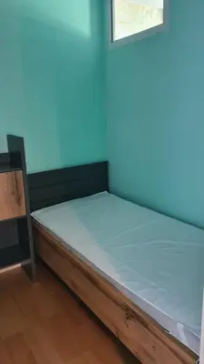 Ein Bett oder Betten in einem Zimmer der Unterkunft Appartement 7 101