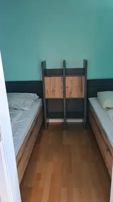 Ein Bett oder Betten in einem Zimmer der Unterkunft Appartement 7 101