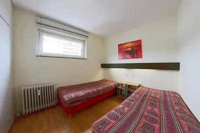 Ein Bett oder Betten in einem Zimmer der Unterkunft Apartment 426