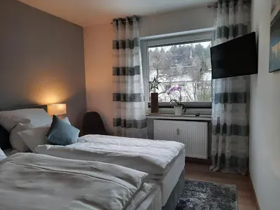 Ein Bett oder Betten in einem Zimmer der Unterkunft Meisensuite