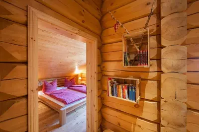 Ein Bett oder Betten in einem Zimmer der Unterkunft Chalet zum Salamander