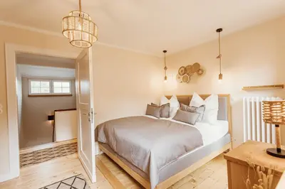 Ein Bett oder Betten in einem Zimmer der Unterkunft Waldchalet Am Steinberg