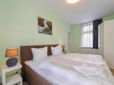 Ein Bett oder Betten in einem Zimmer der Unterkunft Apartment Remise, Wernigerode