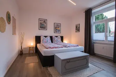 Ein Bett oder Betten in einem Zimmer der Unterkunft Ferienwohnung Vier Findlinge