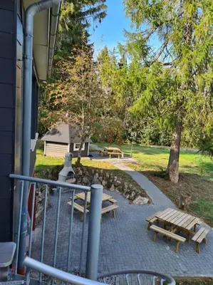 Ein Garten an der Unterkunft Gruppenhaus mit Grillkota für 16 Personen in Hahnenklee