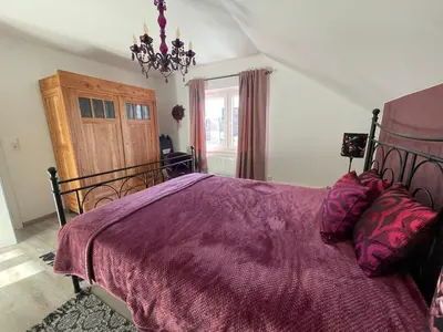 Ein Bett oder Betten in einem Zimmer der Unterkunft Schöne Höhe 600 FeWo Ausguck