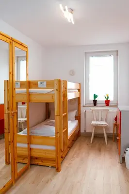 Ein Bett oder Betten in einem Zimmer der Unterkunft Ferienwohnung Bergidylle