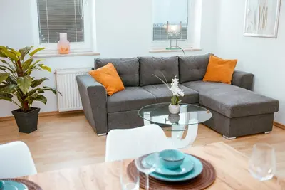 Ein Sitzbereich in der Unterkunft Ferienwohnung Glockenturmblick