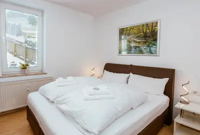 Ein Bett oder Betten in einem Zimmer der Unterkunft Ferienwohnung Glockenturmblick