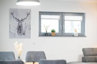 Ein Sitzbereich in der Unterkunft Lindenberg Apartments