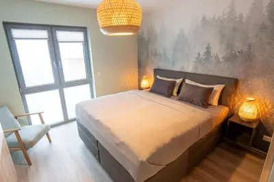 Ein Bett oder Betten in einem Zimmer der Unterkunft Lindenberg Apartments