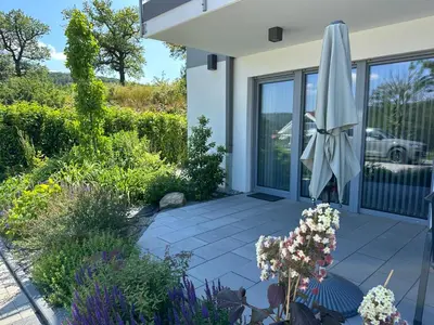 Ein Garten an der Unterkunft Lindenberg Apartments