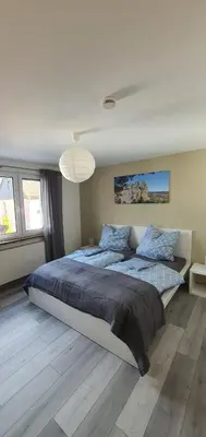 Ein Bett oder Betten in einem Zimmer der Unterkunft Ferienwohnung Teufelsmauer