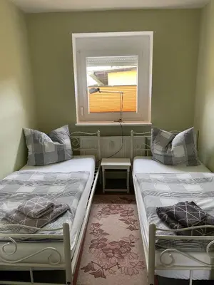 Ein Bett oder Betten in einem Zimmer der Unterkunft Quartier für zwei