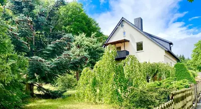 Ein Garten an der Unterkunft Traumhaus Wernigerode mit Sauna und Kamin