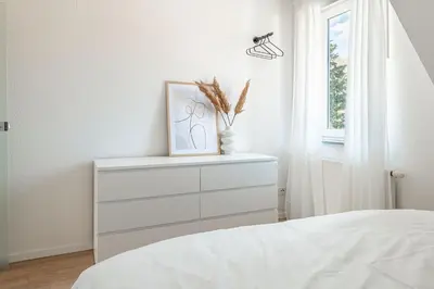 Ein Bett oder Betten in einem Zimmer der Unterkunft Premium Apartment - Ausblick - Kamin - Balkon - Smart TV - Kaffeevollautomat