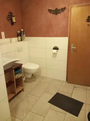 Ein Badezimmer in der Unterkunft Het huisje