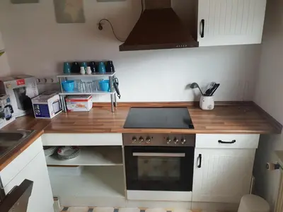 Küche/Küchenzeile in der Unterkunft NEU! FeWo Harzfire mit Kamin