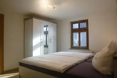 Ein Bett oder Betten in einem Zimmer der Unterkunft Ferienhaus Bomeier