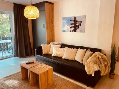 Ein Sitzbereich in der Unterkunft Apartment an der Wurmbergseilbahn 4