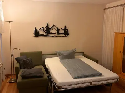 Ein Bett oder Betten in einem Zimmer der Unterkunft Ferienwohnung Landgraf