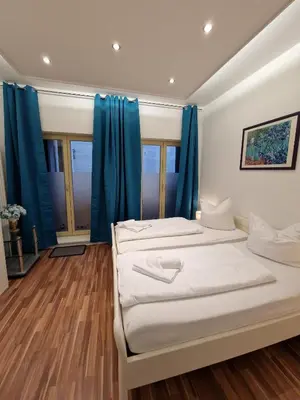 Ein Bett oder Betten in einem Zimmer der Unterkunft Altstadt-Apartment Rothenberg