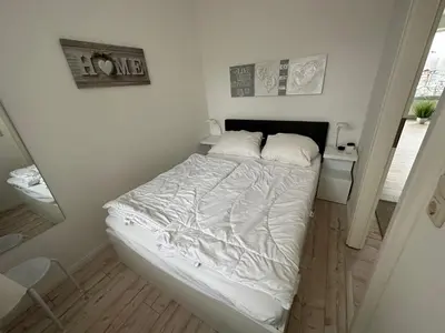 Ein Bett oder Betten in einem Zimmer der Unterkunft Ferienwohnung Harz #4, Pool, Sauna, WLAN