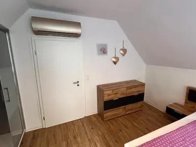 Ein Bett oder Betten in einem Zimmer der Unterkunft HAR(z)MONIE Penthouse in Blankenburg
