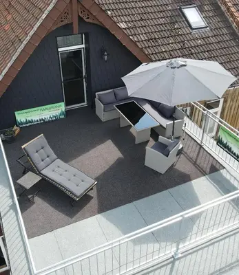 Ein Balkon oder eine Terrasse in der Unterkunft HAR(z)MONIE Penthouse in Blankenburg