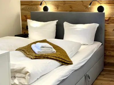 Ein Bett oder Betten in einem Zimmer der Unterkunft wohlBfinden2 appartementhaus