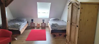 Ein Bett oder Betten in einem Zimmer der Unterkunft HarzRitter Domizil