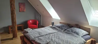 Ein Bett oder Betten in einem Zimmer der Unterkunft HarzRitter Domizil