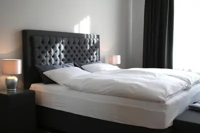 Ein Bett oder Betten in einem Zimmer der Unterkunft Ferienwohnung am Brühl