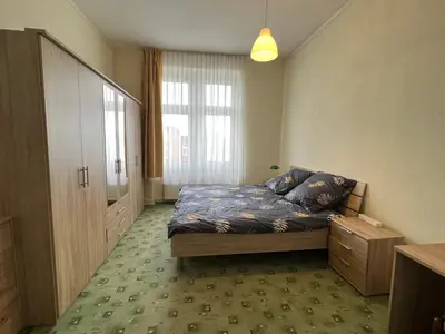 Ein Bett oder Betten in einem Zimmer der Unterkunft Family Apartments Thale