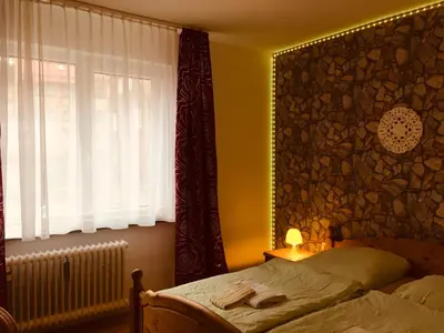Ein Bett oder Betten in einem Zimmer der Unterkunft Ferienhaus am Fluss mit traumhafter Dachterrasse ,Garten und Grill