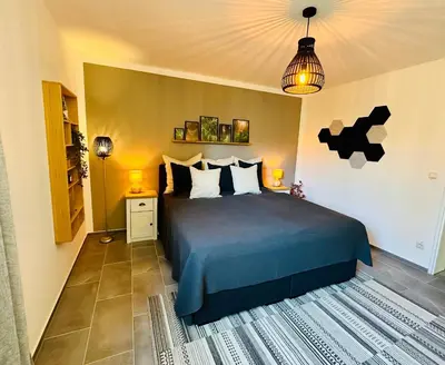Ein Bett oder Betten in einem Zimmer der Unterkunft FeWo Henryk