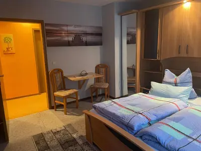 Ein Bett oder Betten in einem Zimmer der Unterkunft Haus Wiesenblick