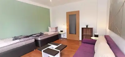 Ein Sitzbereich in der Unterkunft Apartment für bis zu 6 Personen mit Balkon