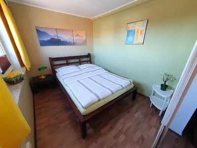 Ein Bett oder Betten in einem Zimmer der Unterkunft Ferienwohnung Kopp