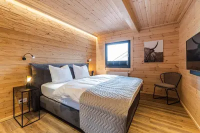 Ein Bett oder Betten in einem Zimmer der Unterkunft Bergwaldchalet Komfort