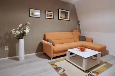 Ein Sitzbereich in der Unterkunft Ferienwohnung Ostard 2