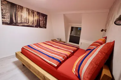 Ein Bett oder Betten in einem Zimmer der Unterkunft Ferienwohnung Ostard 2