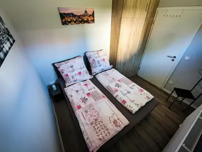 Ein Bett oder Betten in einem Zimmer der Unterkunft Ferienwohnung Vogt