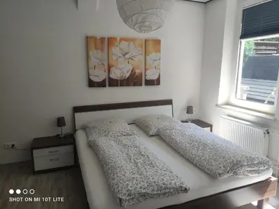 Ein Bett oder Betten in einem Zimmer der Unterkunft Ferienwohnung Kasten