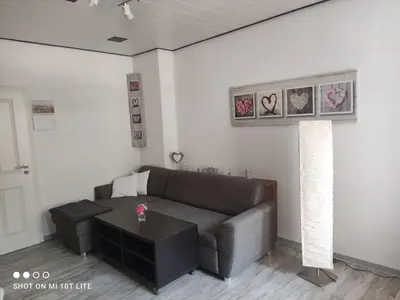 Ein Sitzbereich in der Unterkunft Ferienwohnung Kasten