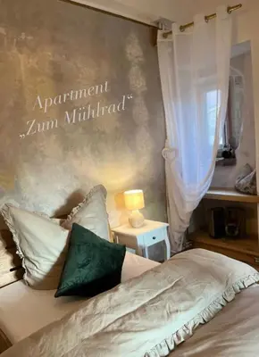 Ein Bett oder Betten in einem Zimmer der Unterkunft Villa Malzmühle - a85020