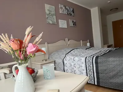 Ein Bett oder Betten in einem Zimmer der Unterkunft Landhaus Pusteblume
