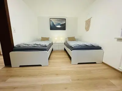 Ein Bett oder Betten in einem Zimmer der Unterkunft Ferienhaus Zorgenfrei