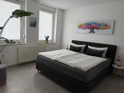 Ein Bett oder Betten in einem Zimmer der Unterkunft Ferienwohnung Amelie